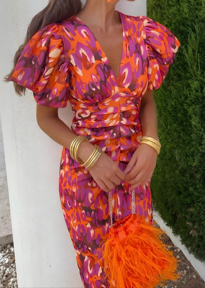 טורה | שמלה אלגנטית עם שרוולים מפליסה